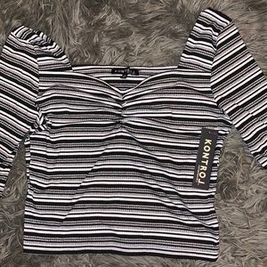 Black gray and white striped crop top.